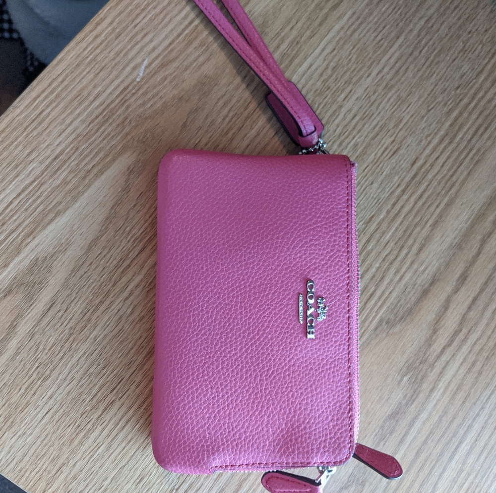 Pink leather Coach wristlet